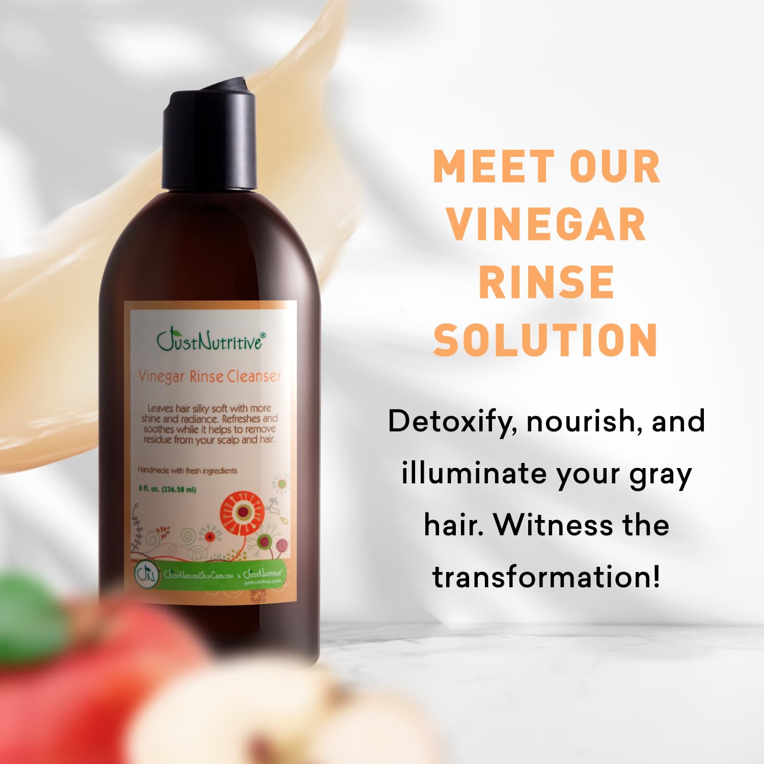 Just Nutritive Vinegar Rinse Cleanser bottle pouring for clean, balanced scalp.