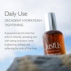 Just Us Tighten + Glow Serum Mist spray in action for a refreshing hydration boost.