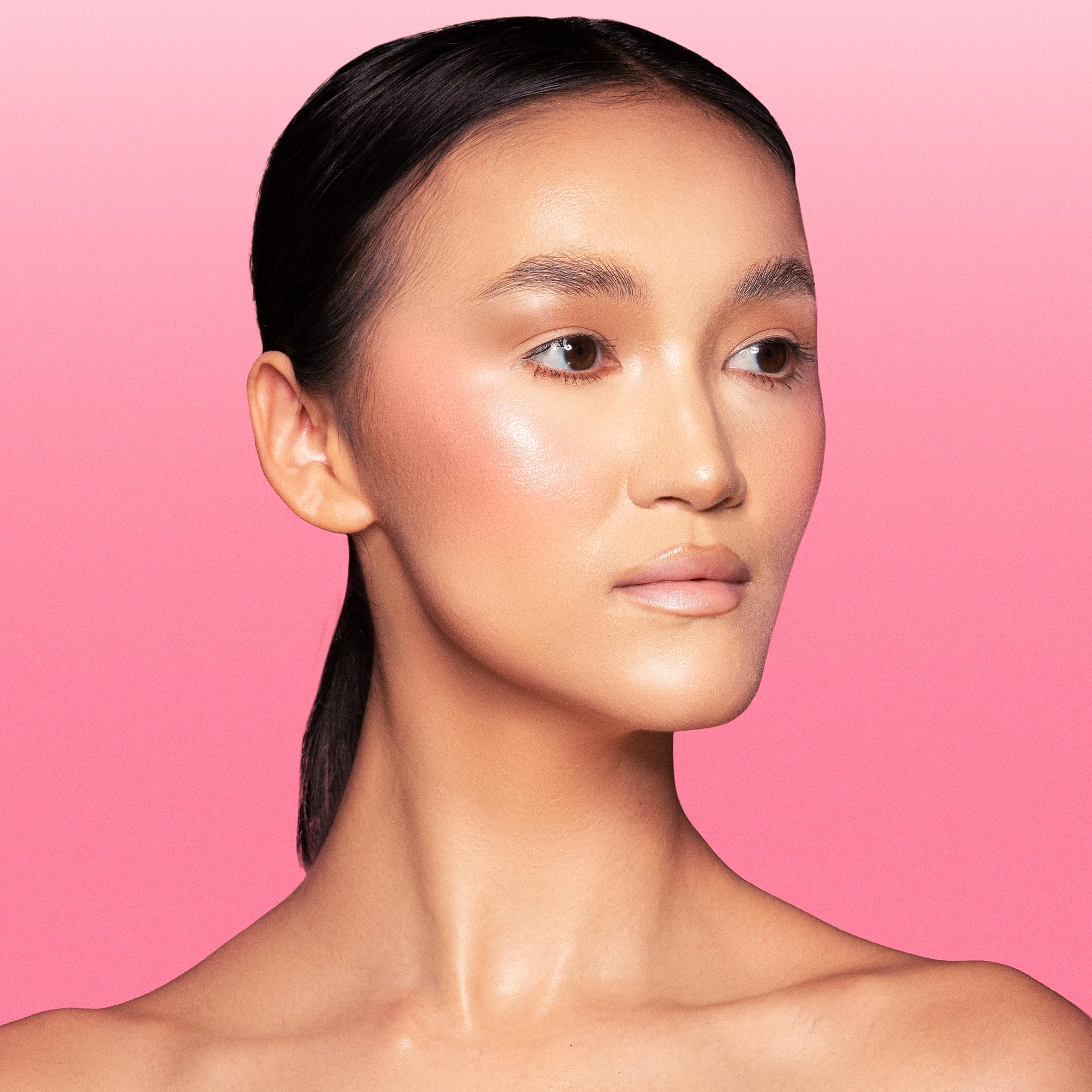 Juvia's Place soft-tulip-glow swatches on skin reveal peachy-pink radiance suitable for many skin tones.