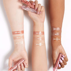 Kaja Gloss Shot Honey Drizzle tube application ideal for quick hydration.