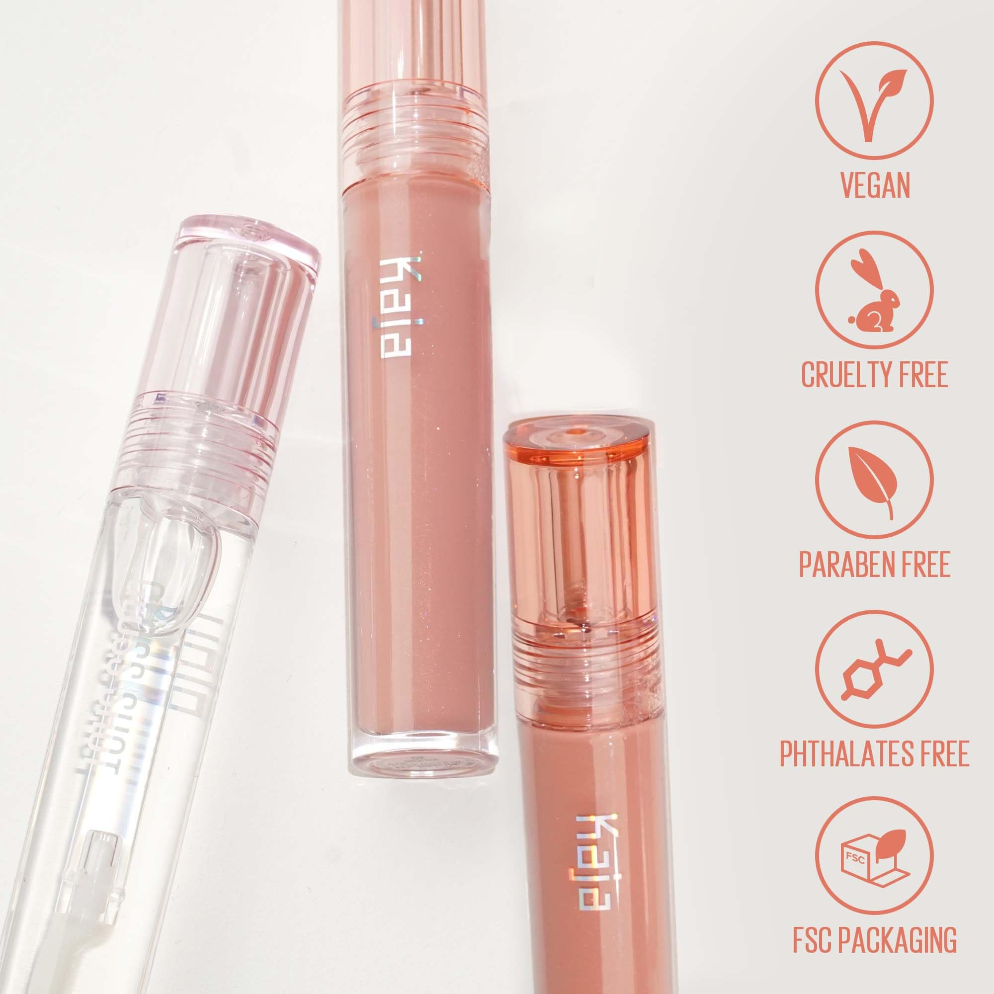 Kaja Gloss Shot Honey Drizzle wand-tip close-up highlights a smooth, non-sticky texture.