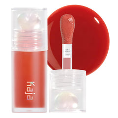 Kaja Juicy Glass Apple Cider bottle shows clear tint with hydrating shine