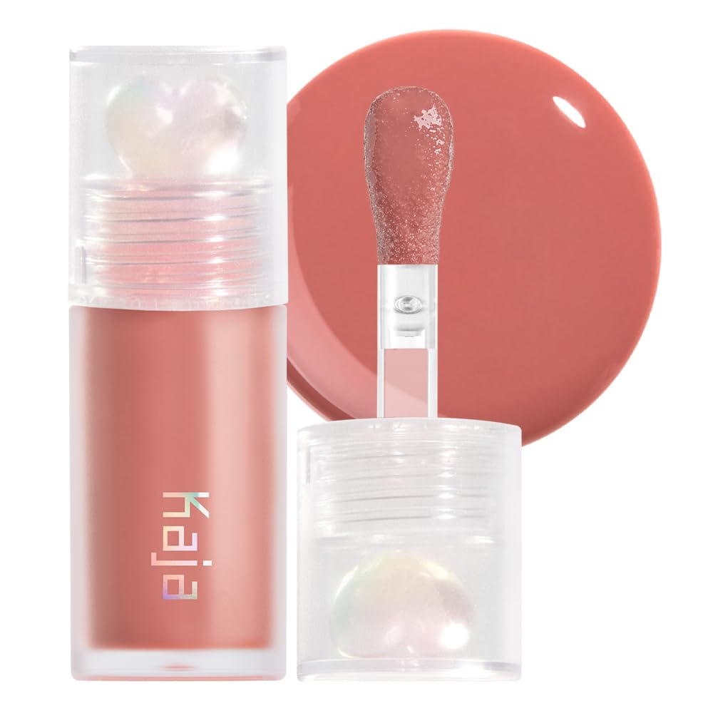 Kaja Juicy Glass Lip Oil Fig Smoothie bottle showing hydrating shine and effortless application.