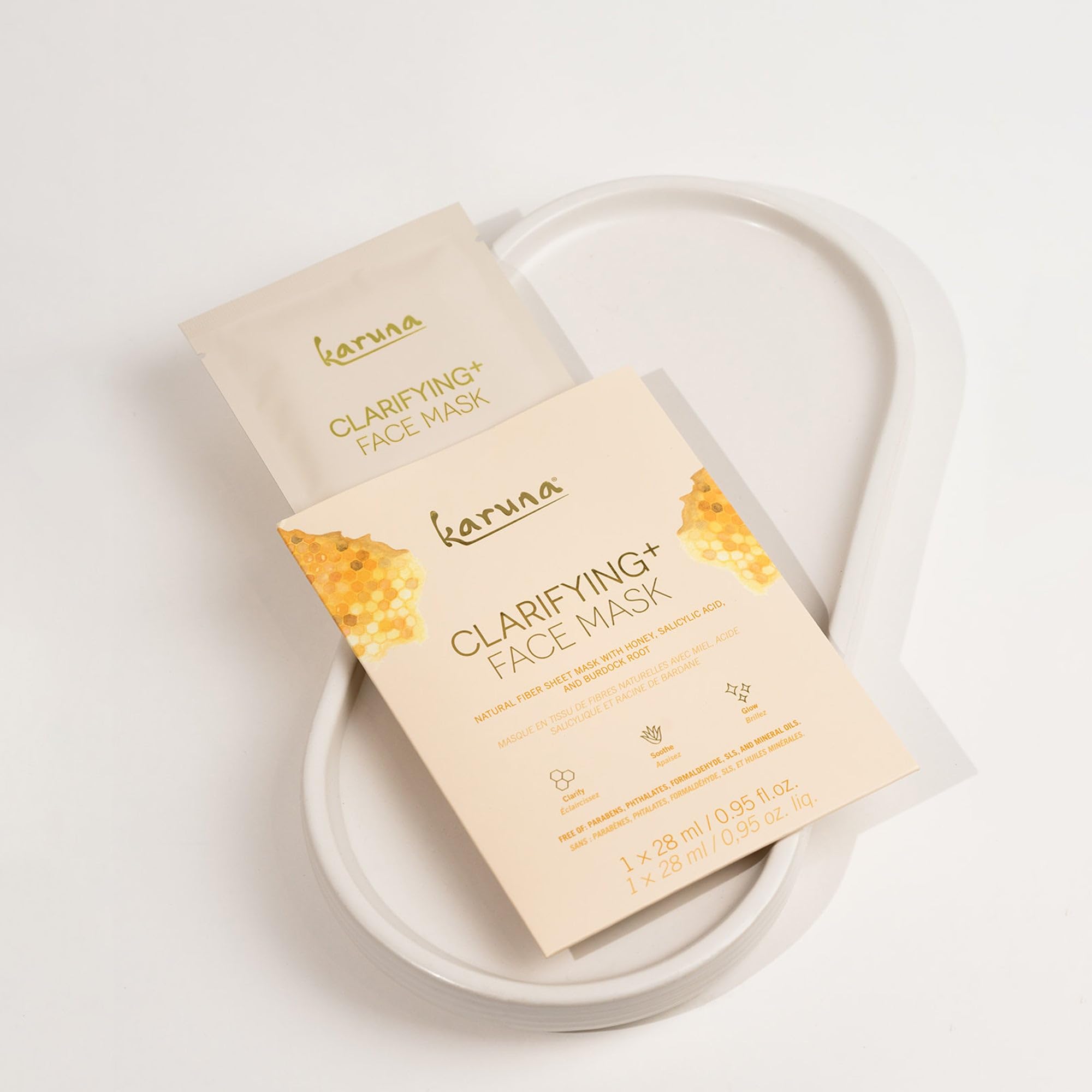 Karuna Age-Defying Mask serum-drenched close-up supports renewed radiance.
