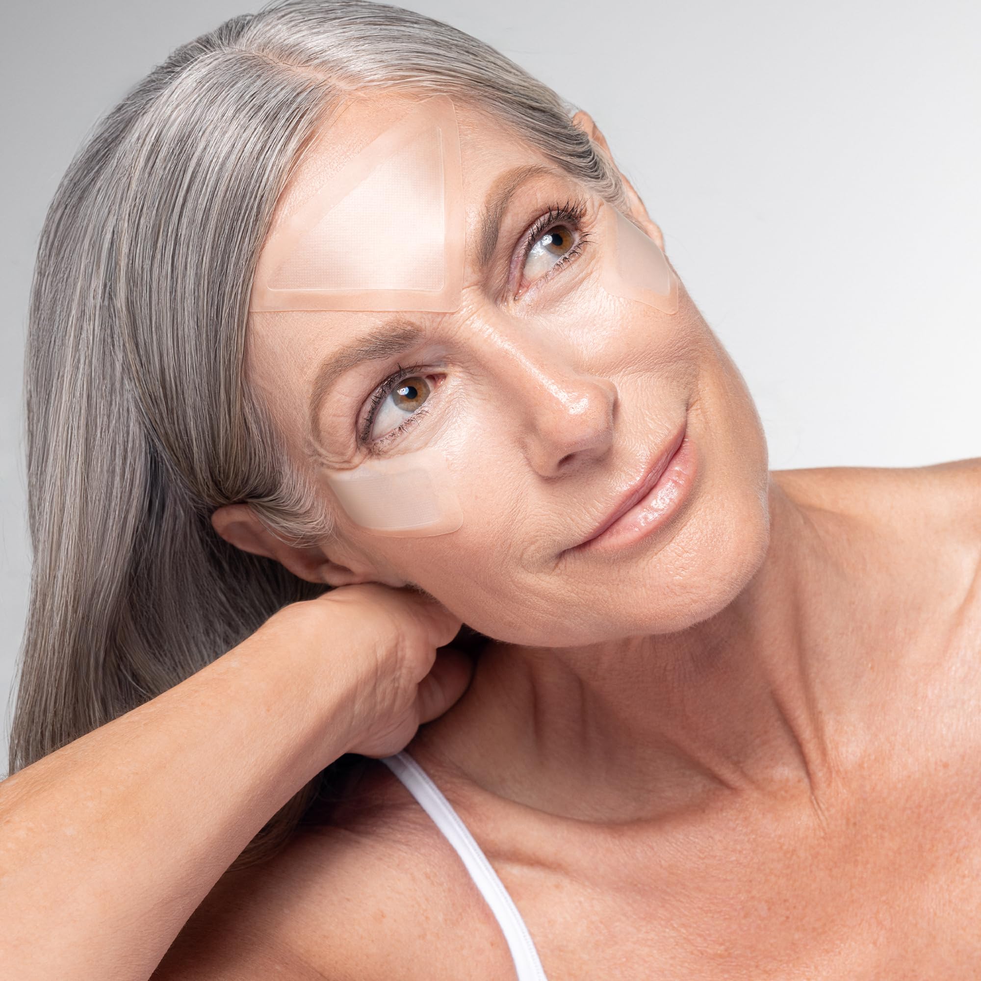 Karuna Age Rewind XL patch on face closeup highlights gentle, skin-friendly design