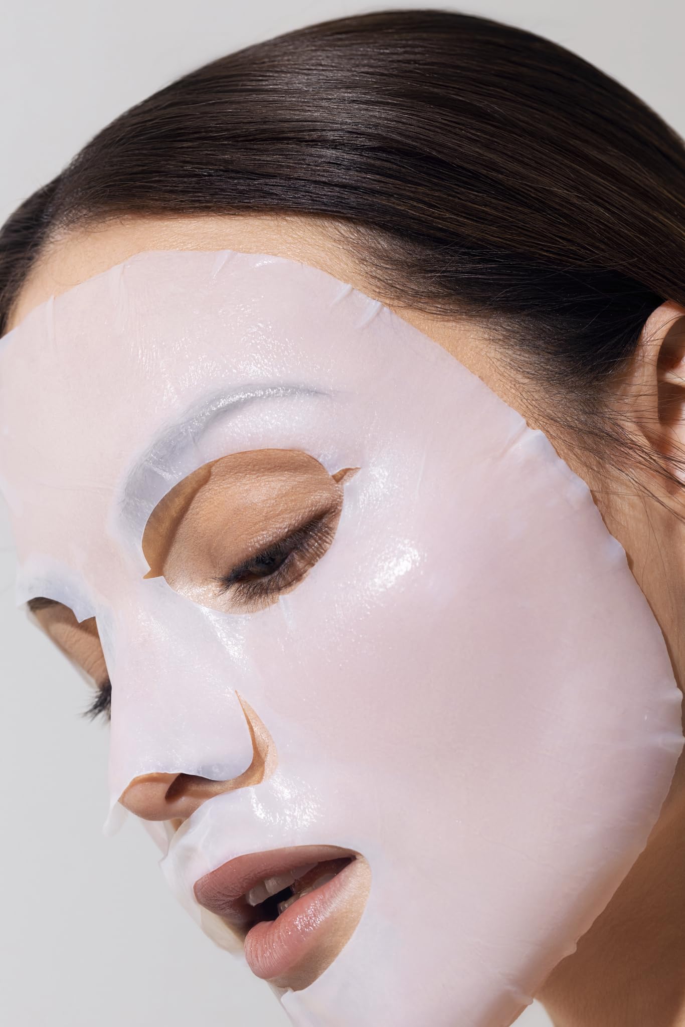 Karuna Face mask application gesture shows easy, at-home pampering.
