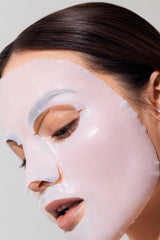 Karuna Face mask application gesture shows easy, at-home pampering.