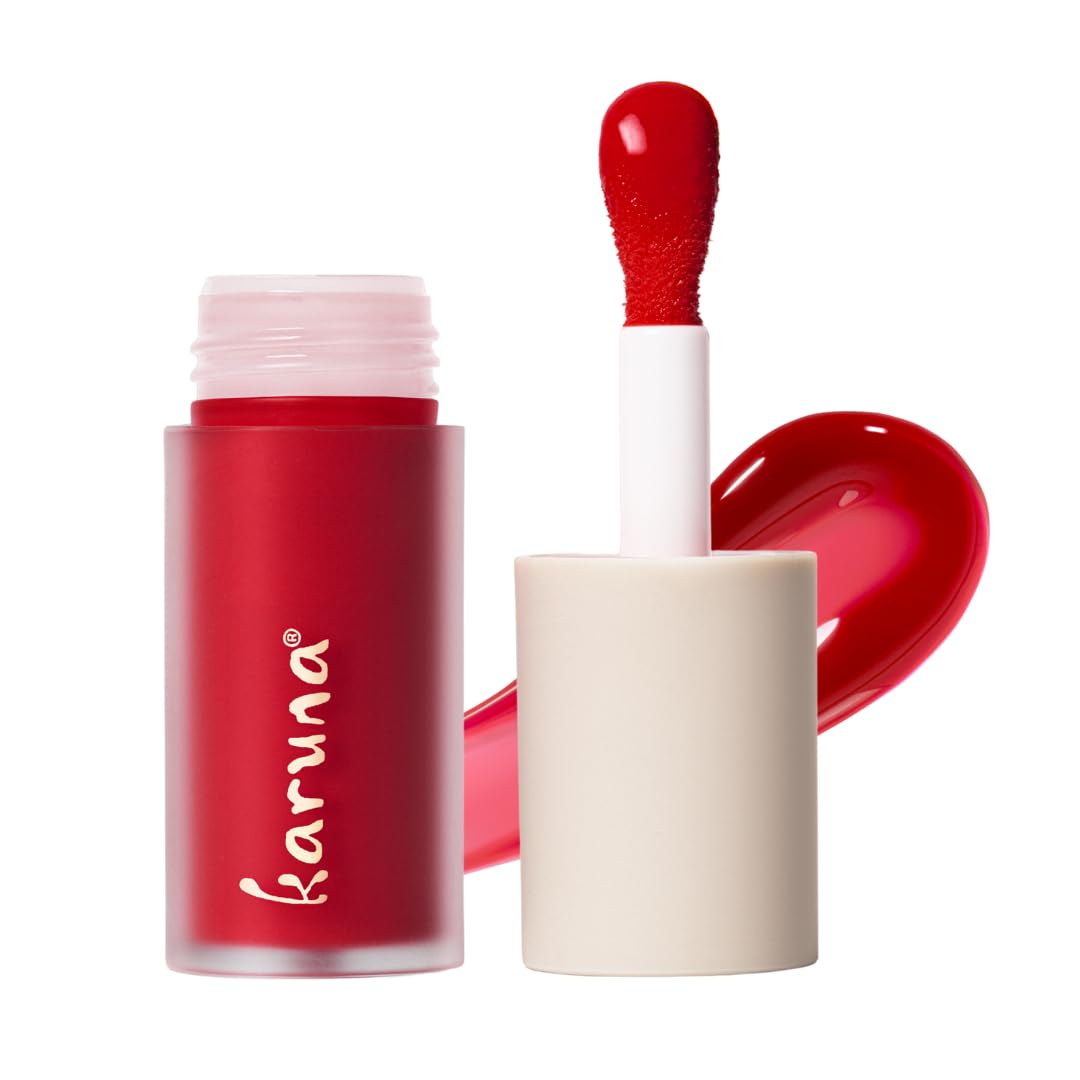 Karuna Skin Tinted Lip Oil bottle close-up showing a smooth, hydrating finish.