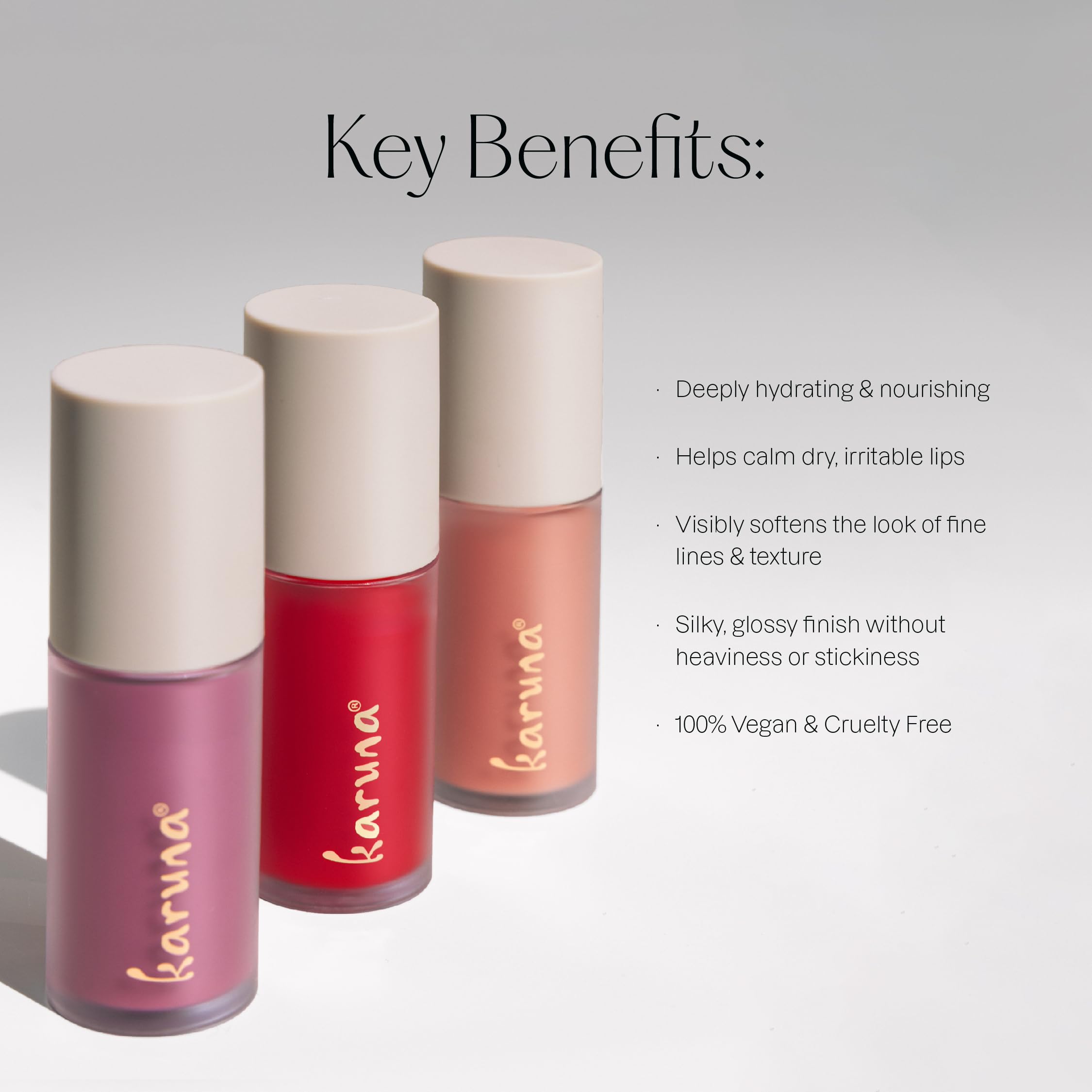 Karuna Skin Tinted Lip Oil vegan formula bottle on white background.