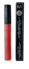 KVD Torch Ginger on lips offers feather-resistant bold look.