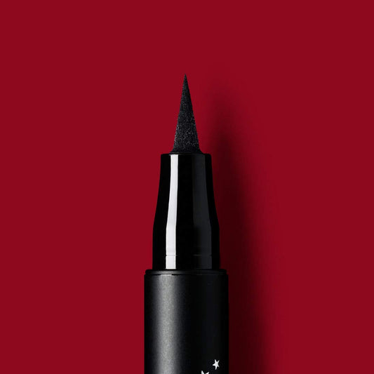 Kat Von D Ultra Ink Liner flexible tip for precise control.