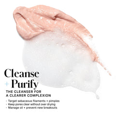 Kate Somerville EradiKate foaming cleanser lather close-up applying to face.