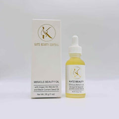 Katz Beauty Miracle Oil texture on skin shows fast absorption with no greasy residue