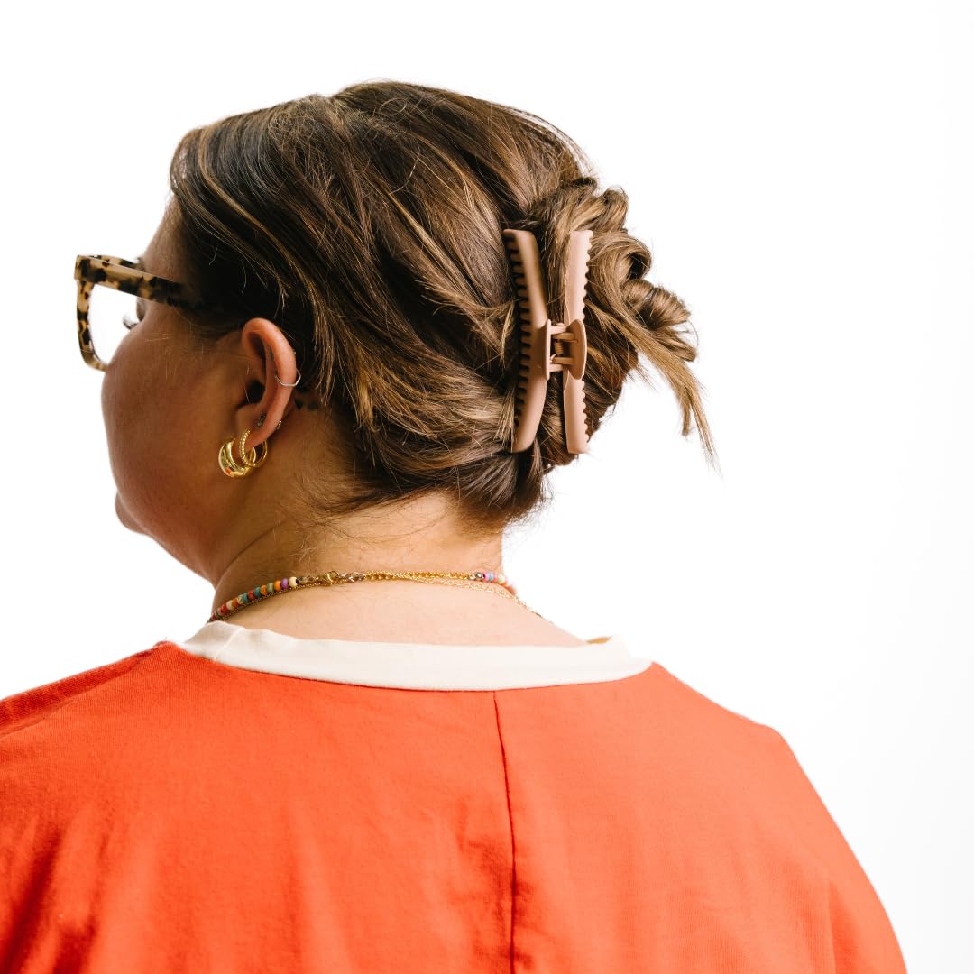 KAXI Midi Claw side bun placement for neat silhouette.
