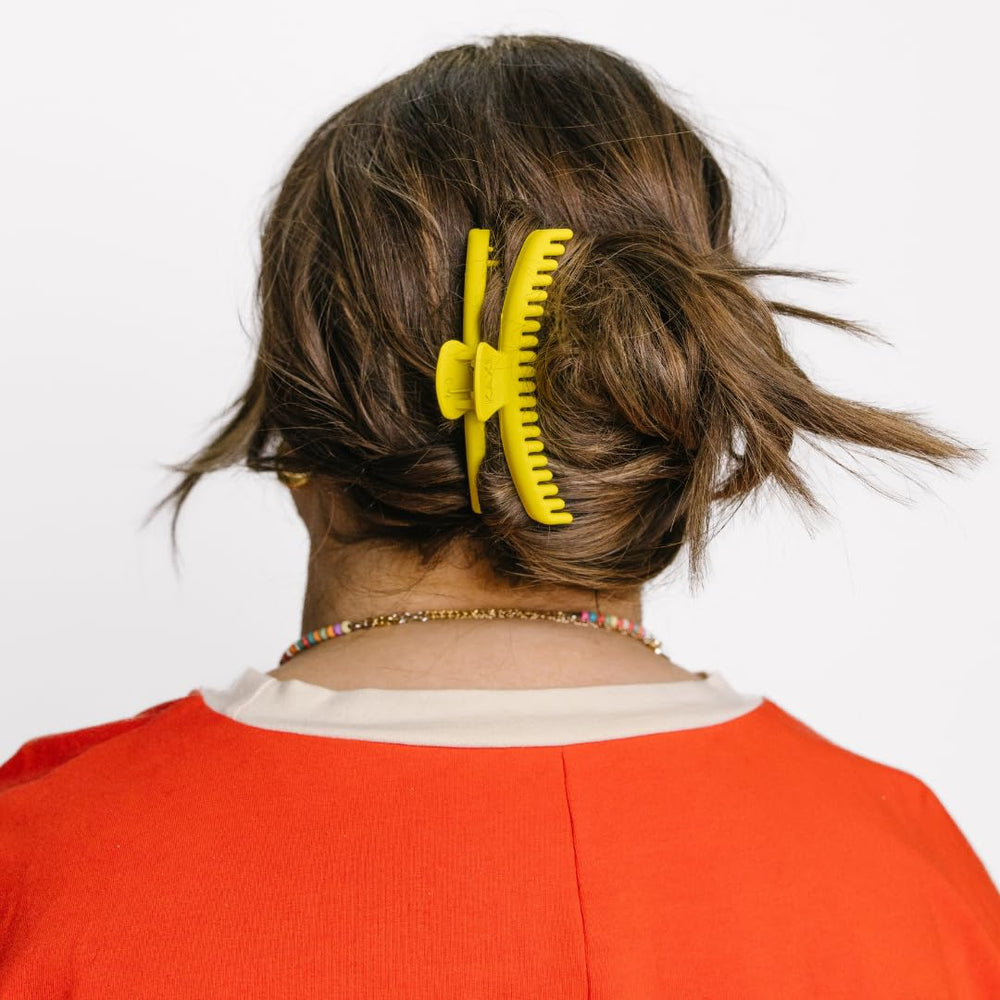 KAXI Hold Everything Midi hair claw neon yellow secures buns during workouts and busy mornings