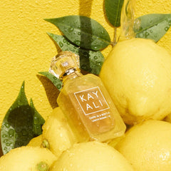 KAYALI Capri in a Bottle Lemon Sugar mini size packaging fits travel rituals.