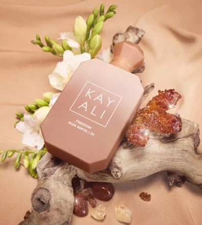 Kayali Freedom Musk Santal bottle close-up highlighting sandalwood and musk notes