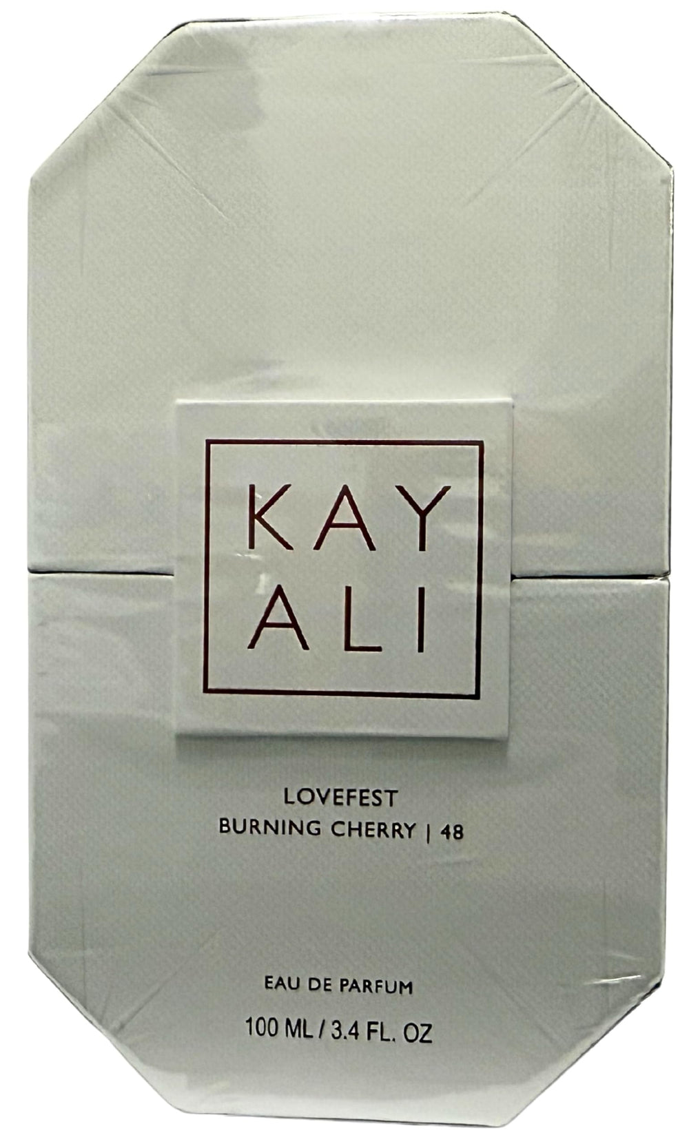 Kayali Lovefest Burning Cherry 48 bottle showing palo santo and guaiac wood base for warm depth.