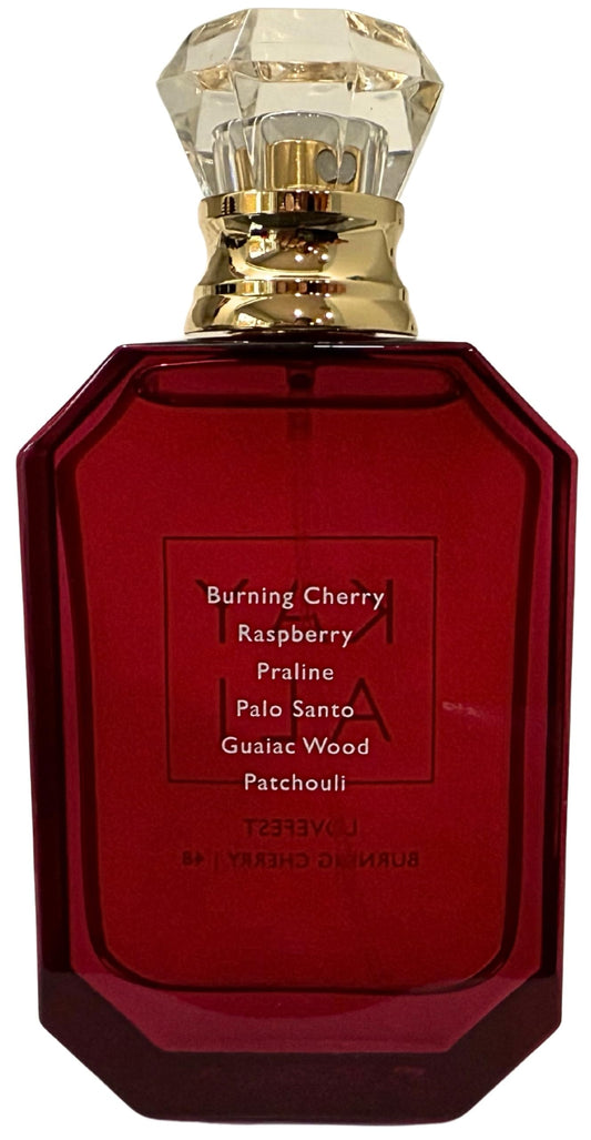KAYALI Lovefest Burning Cherry cap detail with facets signals gift-worthy refinement