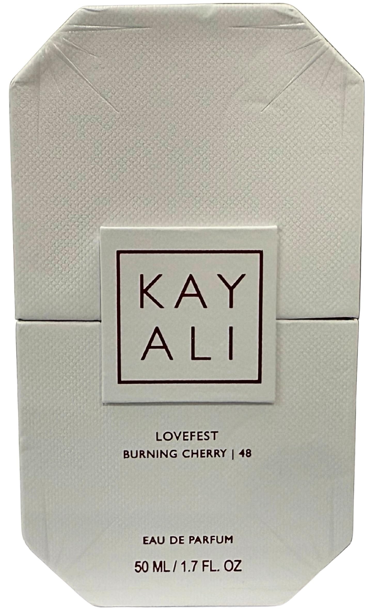 KAYALI Lovefest Burning Cherry bottle spray demonstrates smooth application and convenience
