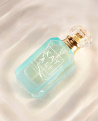 KAYALI Maldives in a Bottle Ylang Coco deluxe mini, perfect for on-the-go fragrance touch-ups.