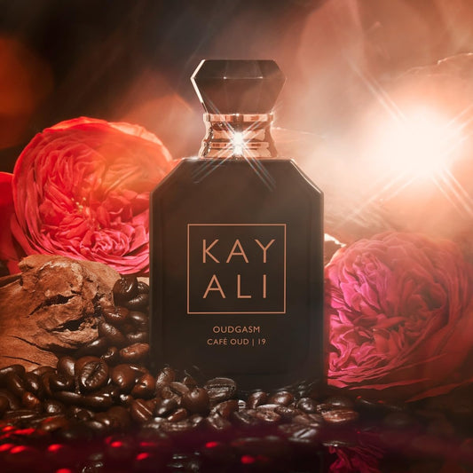 Kayali Oudgasm Café Oud cap close-up showing premium bottle design