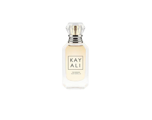 Kayali Wedding Velvet Santal 35 travel spray in 10 ml, ideal for on-the-go fragrance refresh.