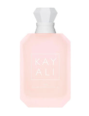 Kayali Yum Boujee Marshmallow bottle with jeweled cap and pink marshmallow notes