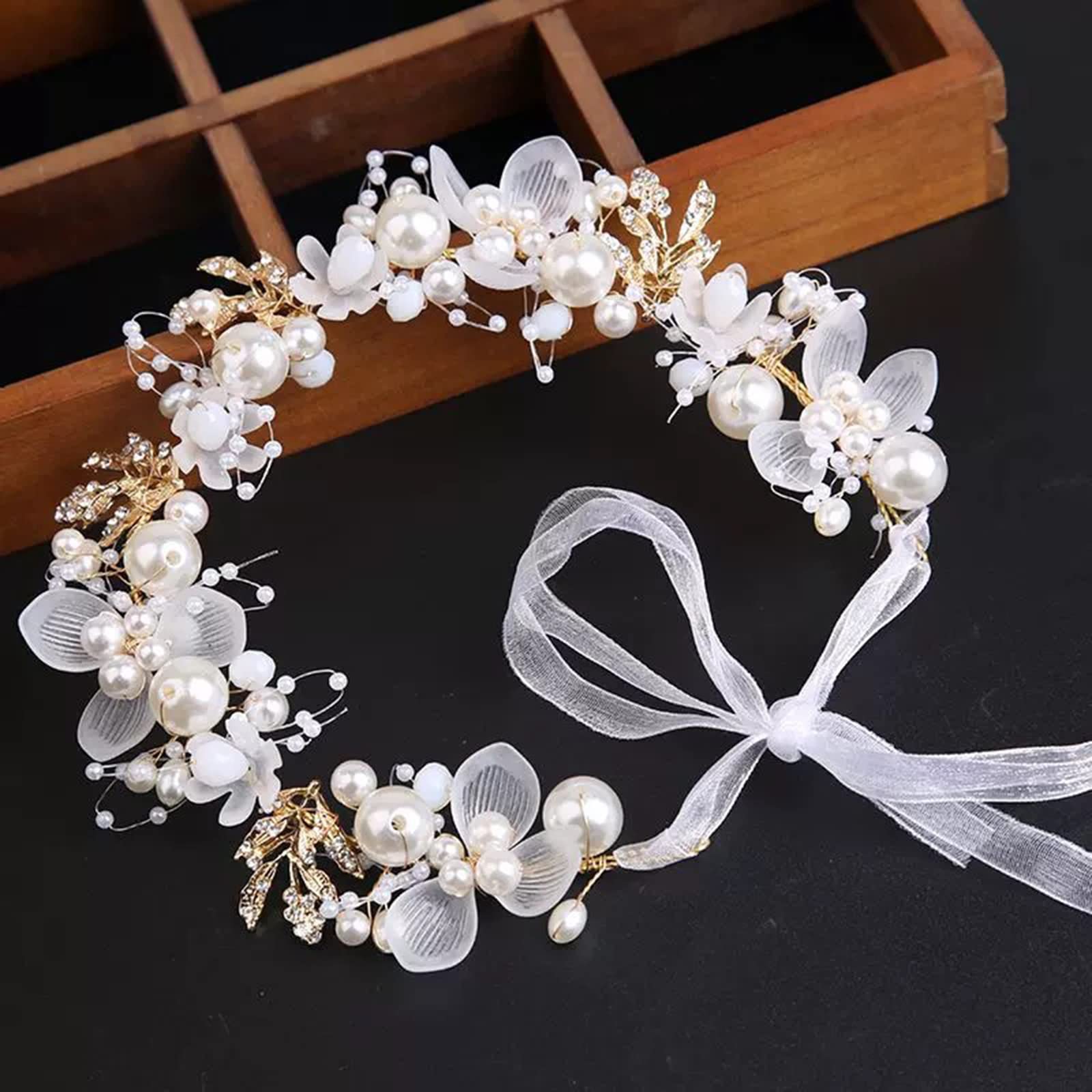 Kayzon white princess headband with crystals and pearls for a glamorous look.