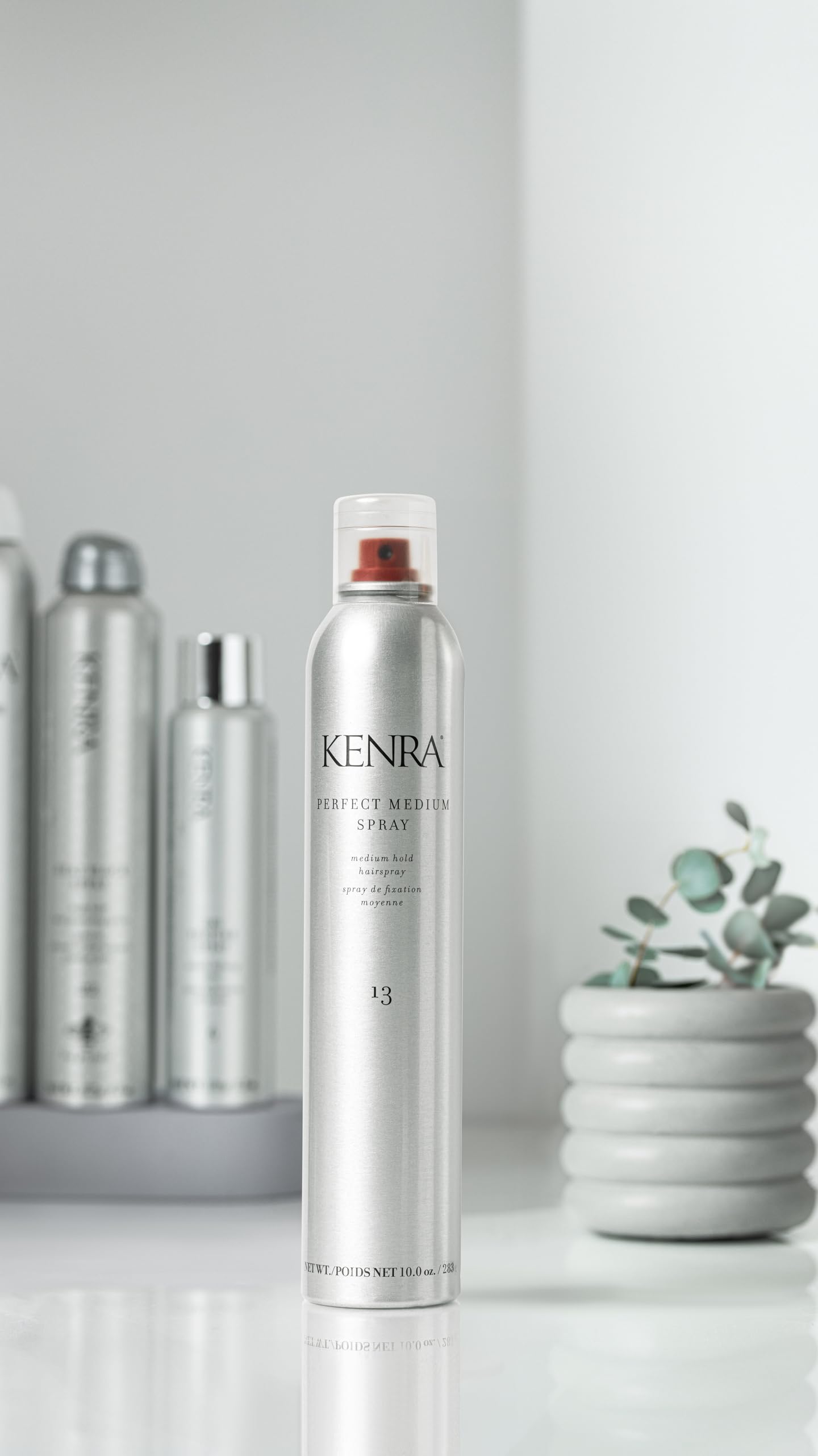 Kenra Perfect Medium Spray 13 color-life cue suggests color protection benefits.