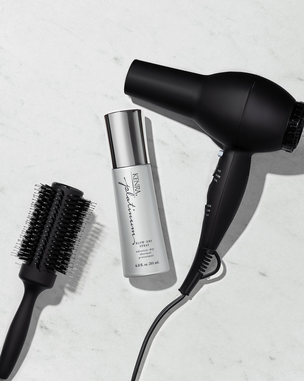 Kenra Platinum Blow-Dry Spray used on humidity-prone day for protection