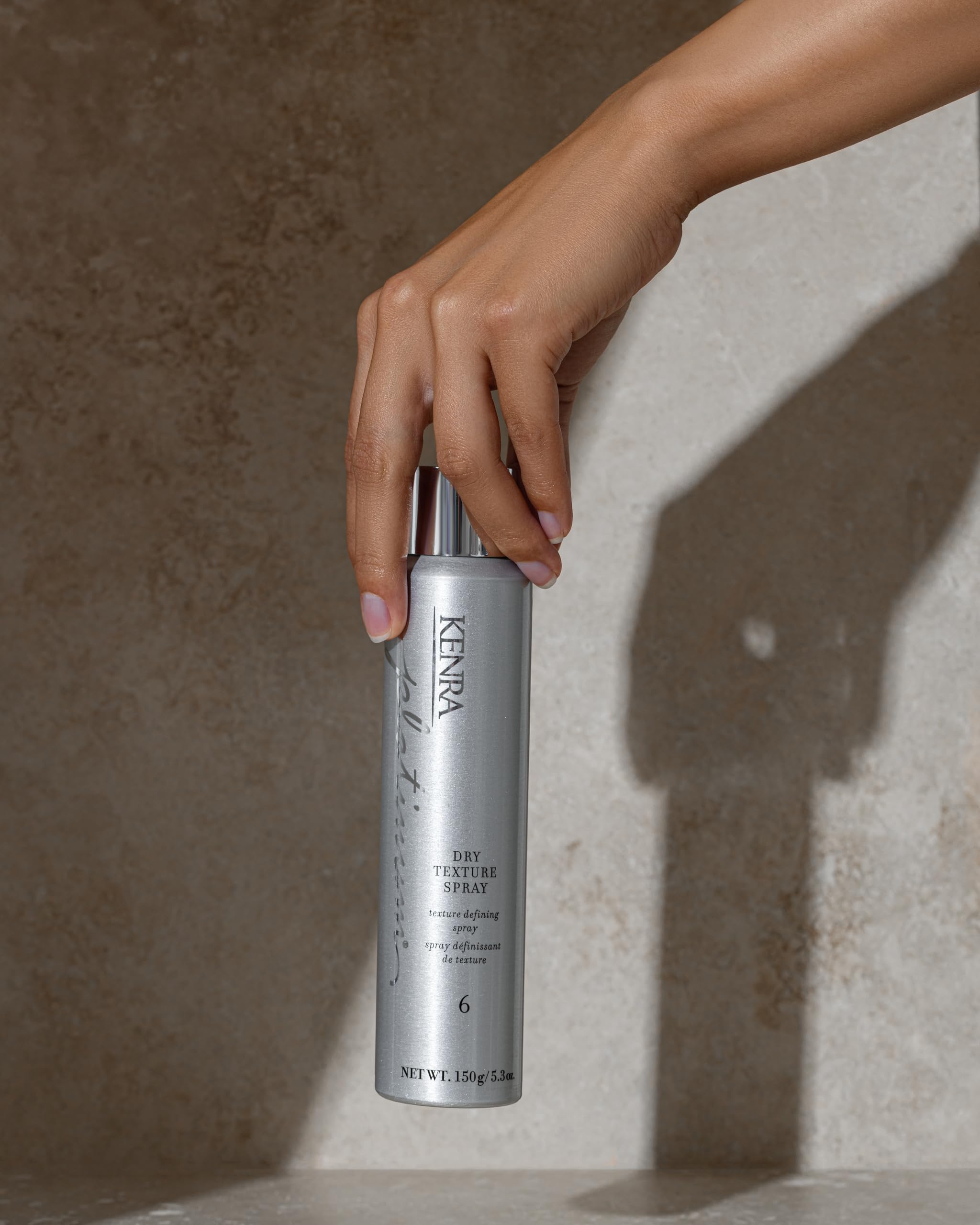 Kenra Platinum Dry Texture Spray absorbs oils and impurities to refresh hair