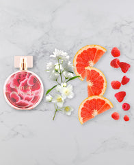 kensie Rosy Bloom bottle on vanity suggesting versatile, everyday scent for any occasion