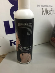 KERA FRUIT keratin kit applying treatment on hair.