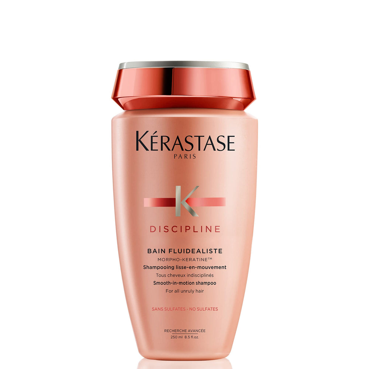 Kerastase Discipline shampoo bottle shows smoothing, frizz control benefits.