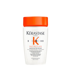 KÉRASTASE Nutritive Bain Satin Riche bottle in travel size for moisture renewal.