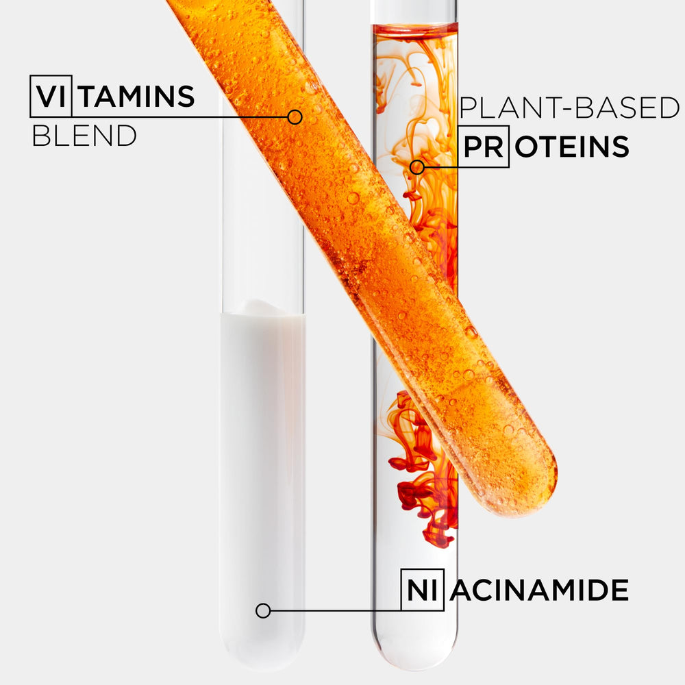 KÉRASTASE Nutritive Bain Satin Riche display in a bathroom setup.