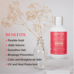 Hands applying Kerotin Leave-in Conditioner to wet hair for detangling.
