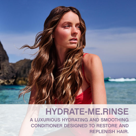 KEVIN.MURPHY Hydrate-Me.Rinse pump-action bottle in hand for easy conditioning.
