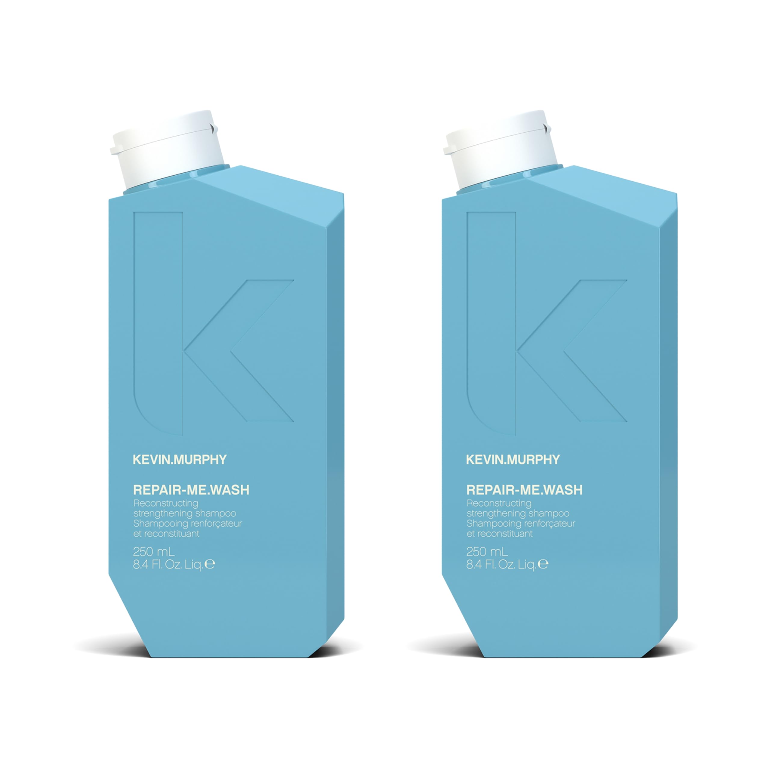 Kevin.MURPHY Repair.Me.Wash bottle front, hydrating shampoo for damaged, frizzy hair.