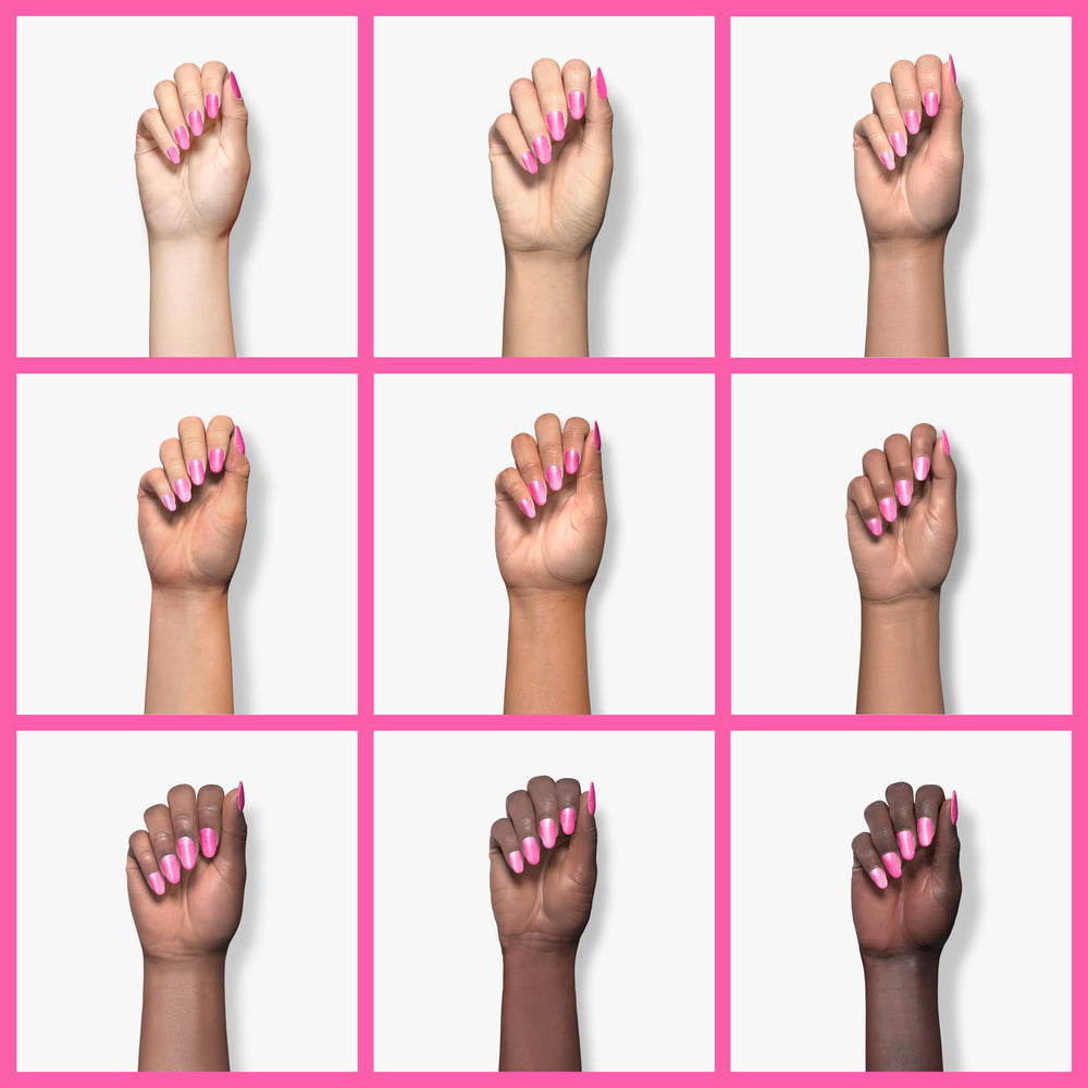 Kiara Sky Fireball dip powder brush stroke on a natural nail.