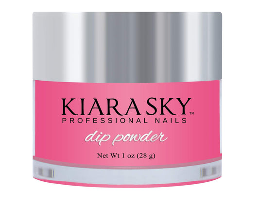 Kiara Sky Flamin-Glo dip powder bottle close-up with pink glow for radiant nails.