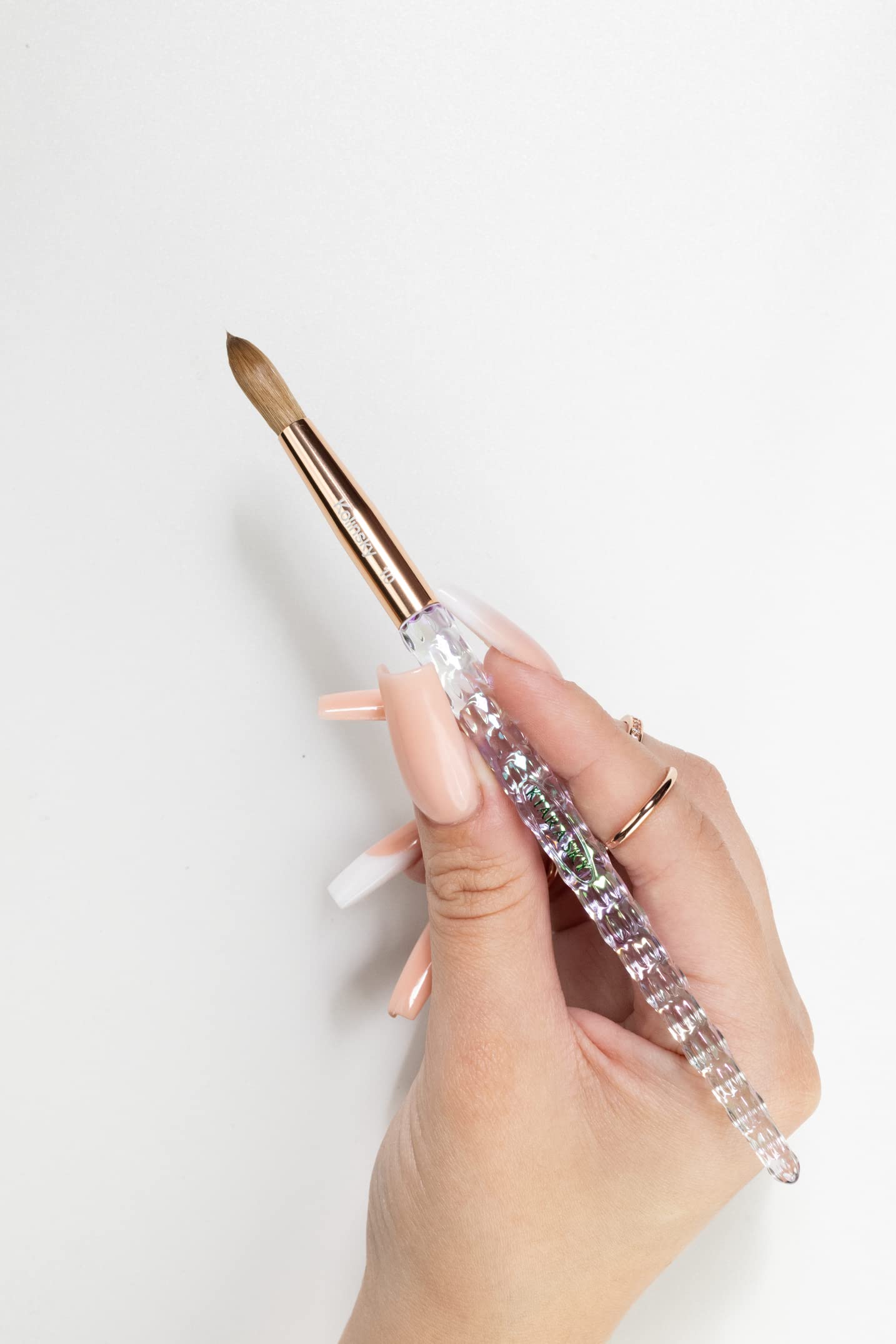 Kiara Sky top coat bottle for a lasting, glossy finish