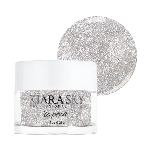 Kiara Sky Winter Wonderland dip powder bottle close-up showing a crisp white shade for durable nails.