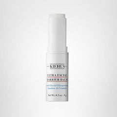 Kiehl's Ultra Facial Barrier Balm stick being used on dry hand area