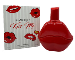 Kimberly's Kiss Me sleek packaging elevates a modern fragrance experience on the nightstand.