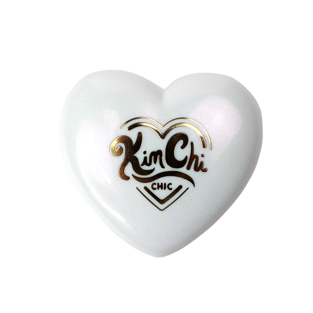 KimChiChic Pearl Gone Wild highlighter in compact with mirror for easy touch-ups.