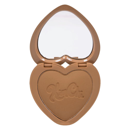 KimChiChic Beauty Thailor Bronzer compact in a heart-shaped case for quick on-the-go glow.