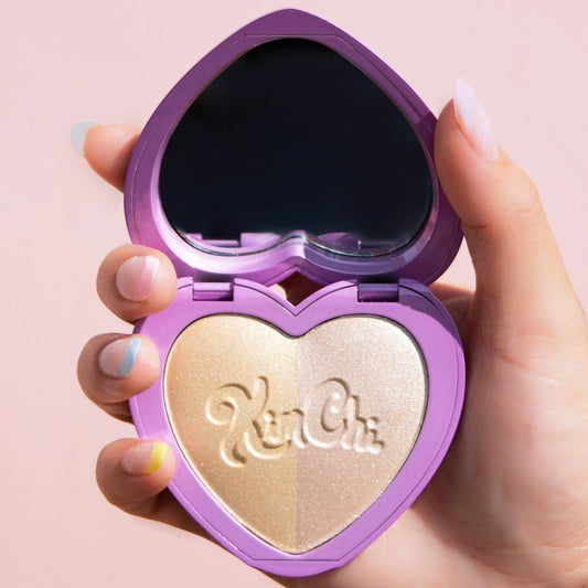 KimChiChic Beauty Get Glow two-shade highlighter for face and body.