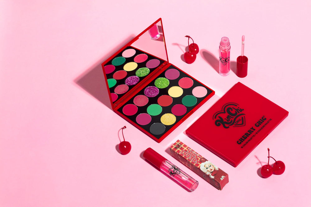 KimChiChic Cherry Chic packaging close-up highlights talc-free formula and vitamin E.